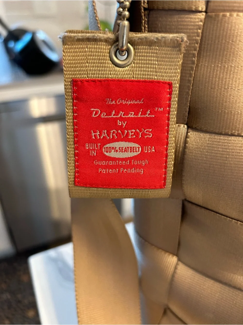 Harvey’s The Original Crossbody Shoulder Bag - Taupe. 13” x 11” x 4”